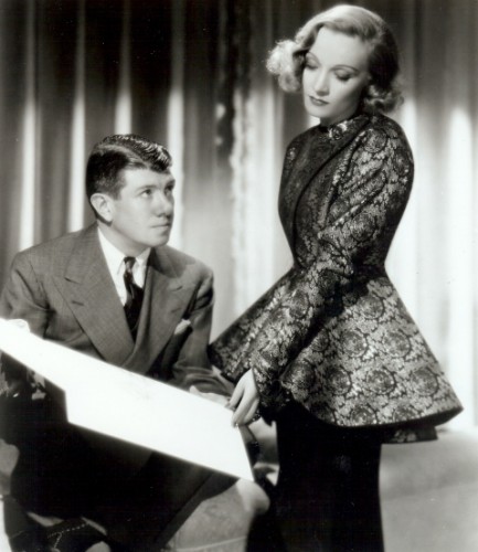 Travis Banton and Marlene Dietrich reviewing a costume sketch